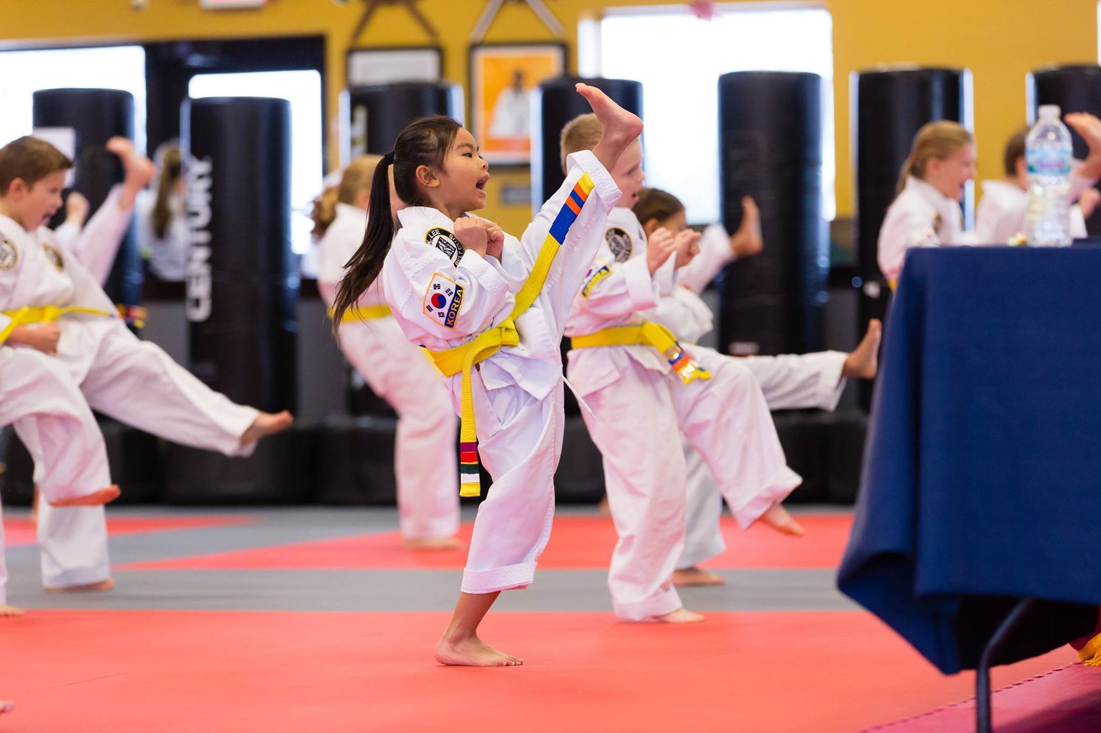 Young JK Lee student performing a focused front kick